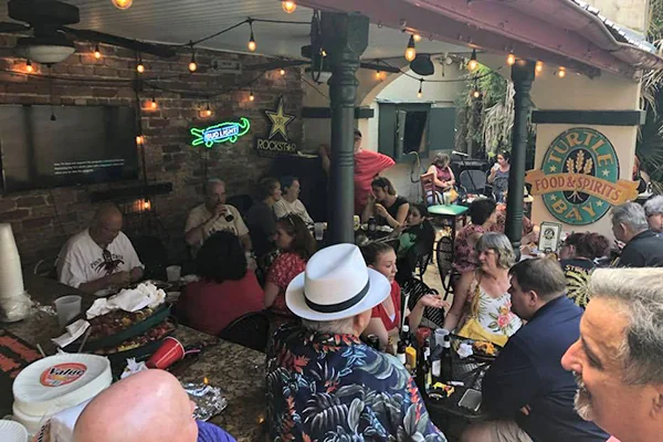 Friends celebrating in the courtyard